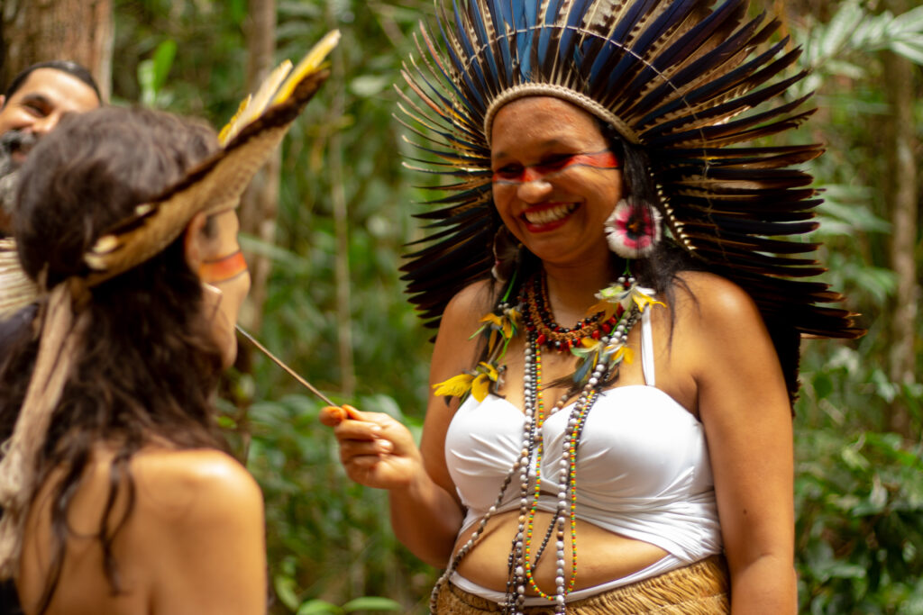 Shaman Sanderline smiling during a healing ritual.