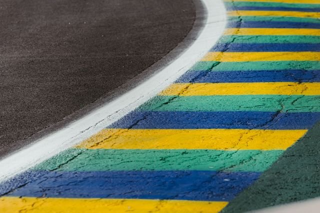 Detailed view of colorful curbs on a race track in Interlagos, São Paulo, Brazil.